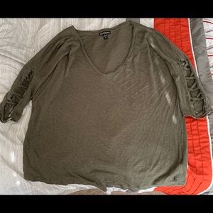 Express quarter length sleeve shirt.